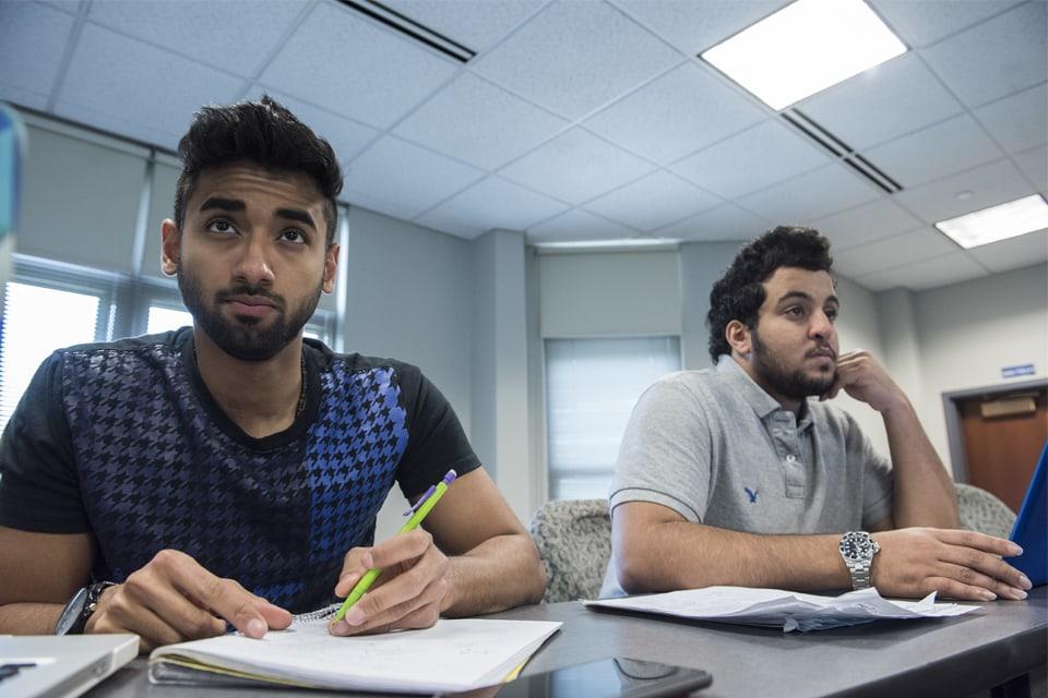 M.S. - S.C.M. students take active notes in class.