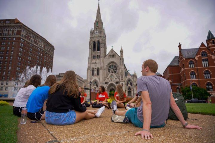 Students Talking Next to Fountain